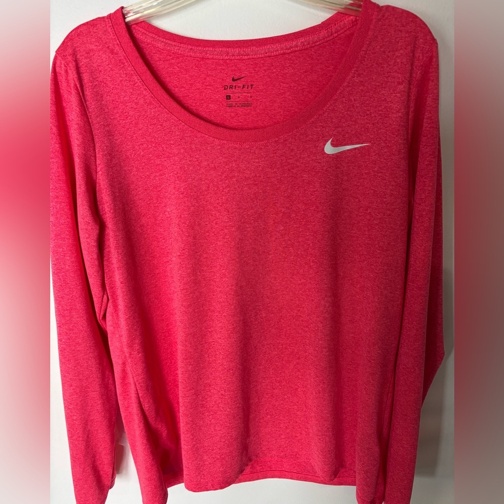Nike long sleeved dri fit long sleeved shirt. Coral color.